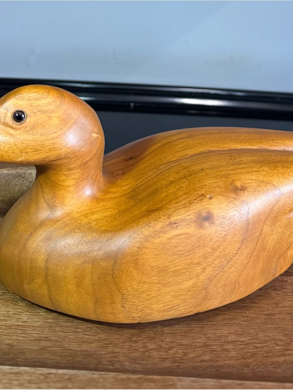 Hand-Carved Wooden Duck Figurine in Warm Brown